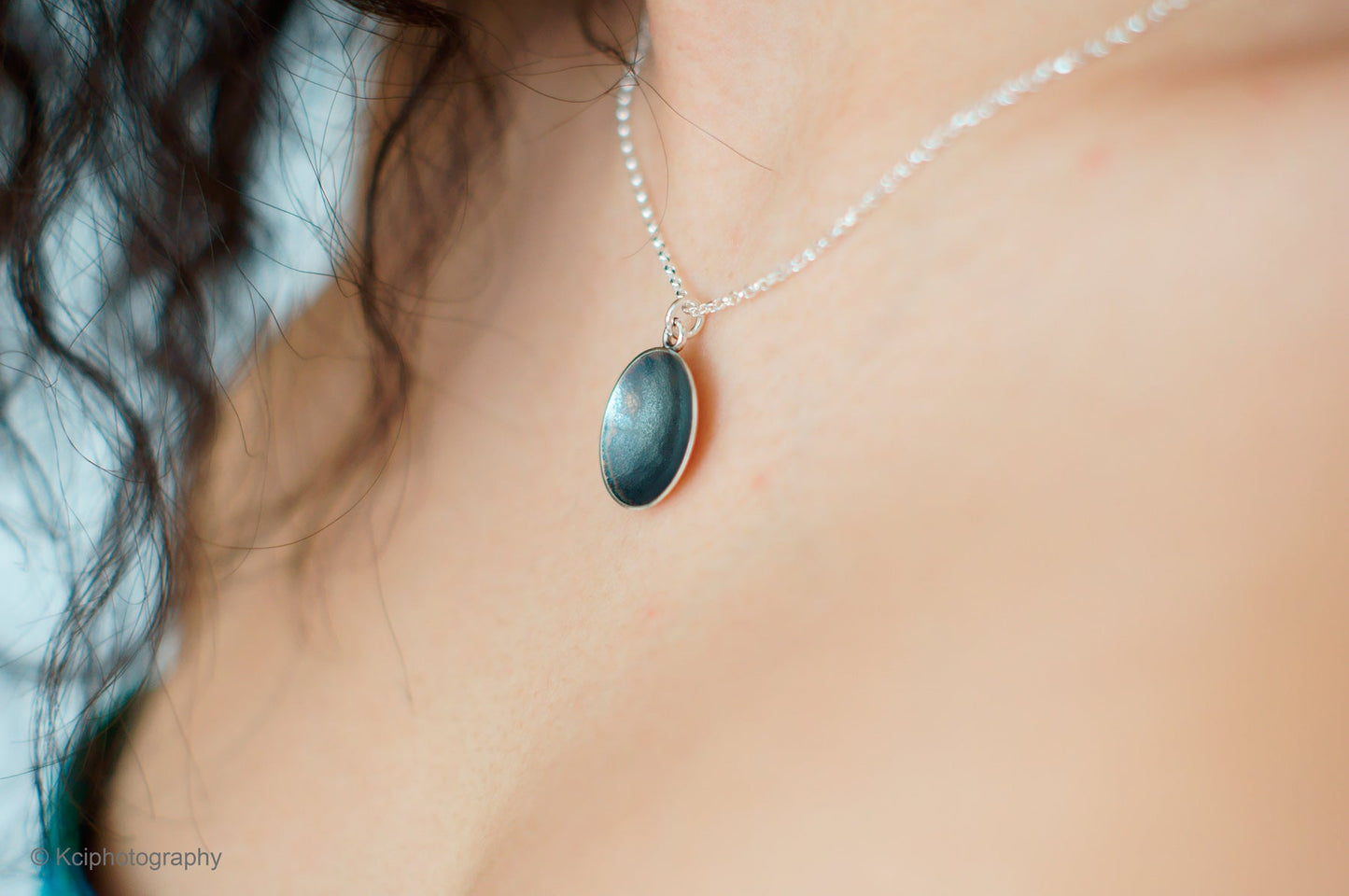 Kate Phipps Jewellery Domed circles necklace reversible oxidised silver concave side model photo 2