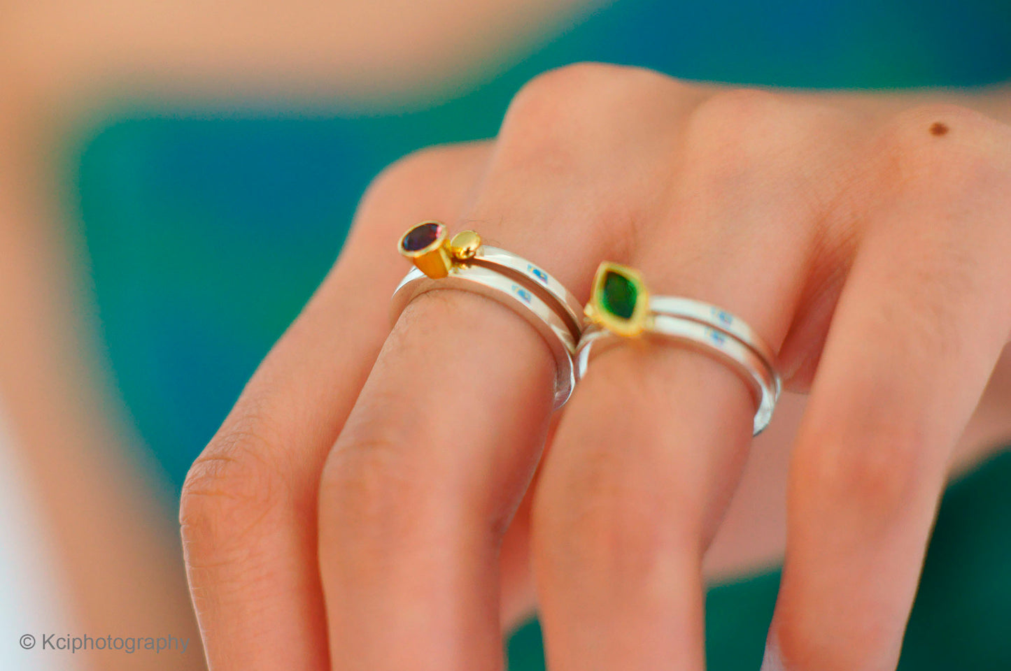 Kate Phipps Jewellery Nugget stacking ring pairs with amethyst tsavorite garnet 18 carat gold settings and nugget on silver ring bands model photo 1