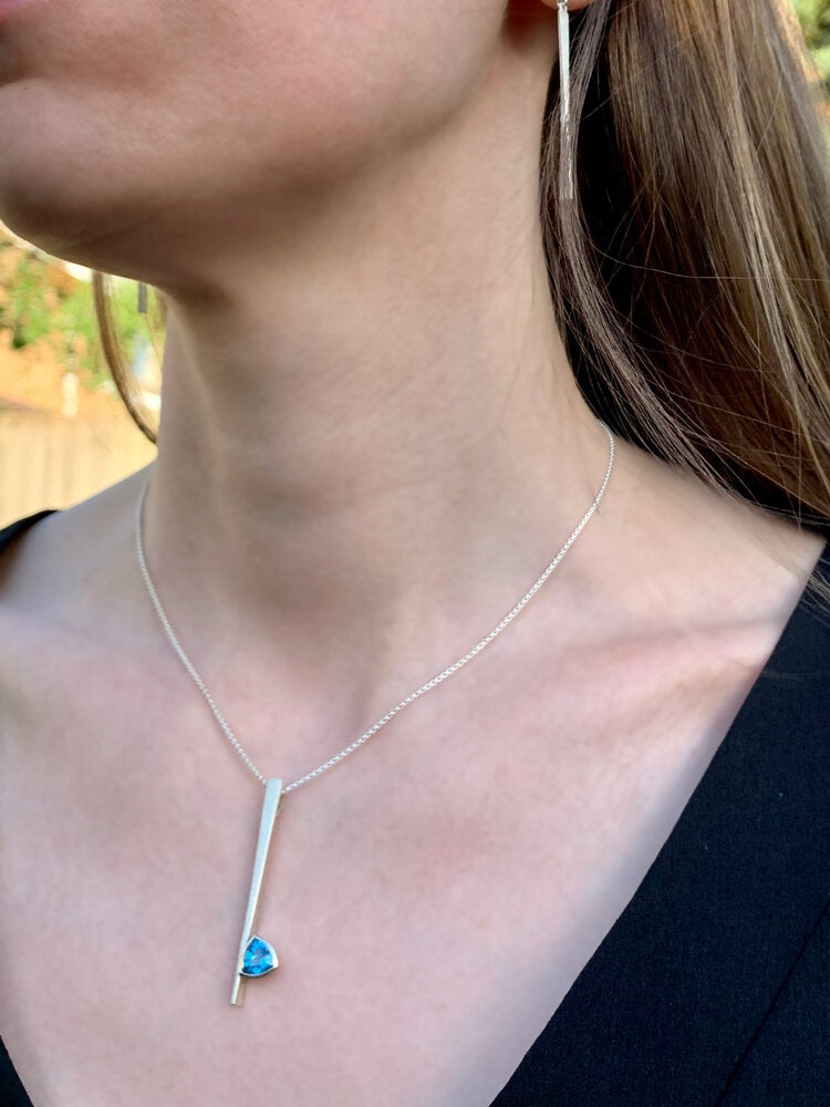 Kate Phipps Jewellery silver and trillion cut Swiss blue topaz necklace model photo