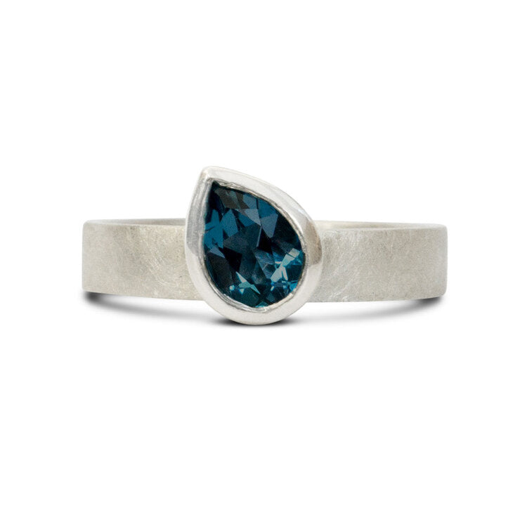 KatePhippsJewellerySolitairering7x5peardarkerLondonbluetopazandsilveroffsetstone