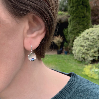 Kate Phipps Jewellery Domed circles drop earrings leaf skeleton textured silver with peacock pearl model photo