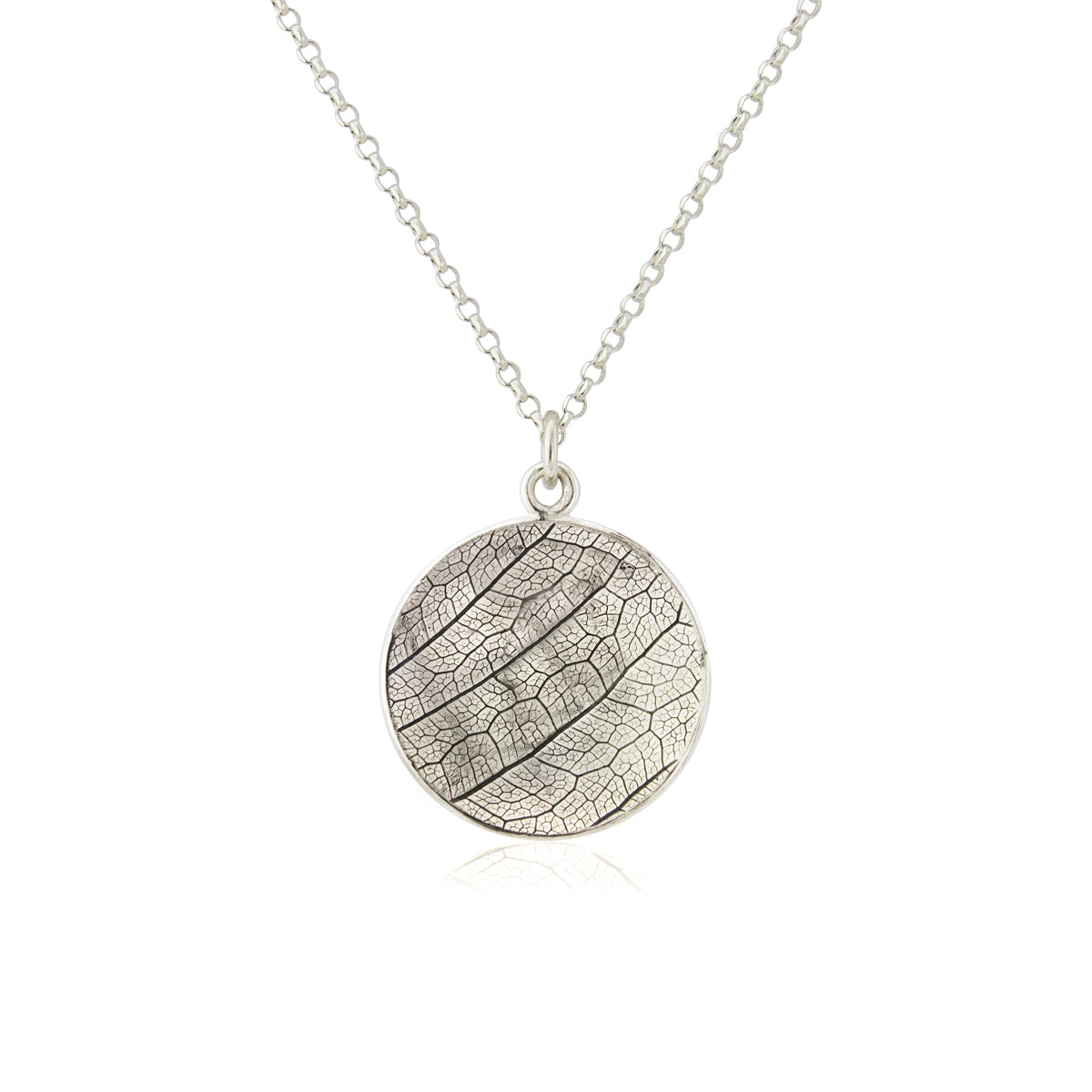 Kate Phipps Jewellery Domed circles necklace 21mm reversible leaf skeleton textured oxidised silver concave side product photo