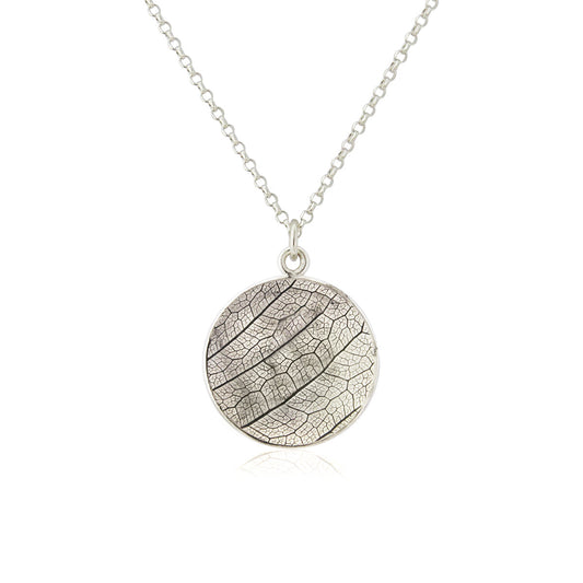 Kate Phipps Jewellery Domed circles necklace 21mm reversible leaf skeleton textured oxidised silver concave side product photo