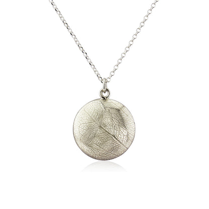 Kate Phipps Jewellery Domed circles necklace 21mm reversible leaf skeleton textured silver convex side product photo