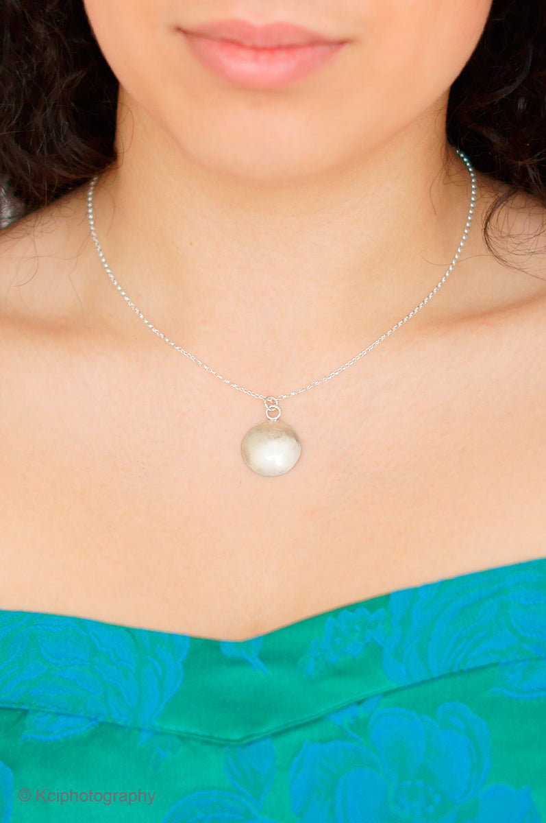 Kate Phipps Jewellery Domed circles necklace reversible silver convex side model photo