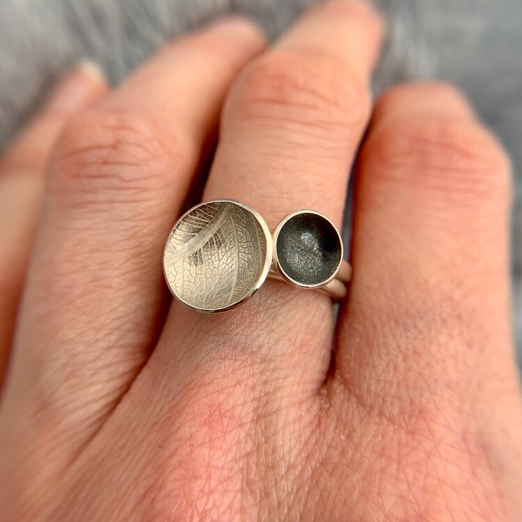 Kate Phipps Jewellery Domed circles rings 2 silver rings medium oxidised and large leaf skeleton textured model photo