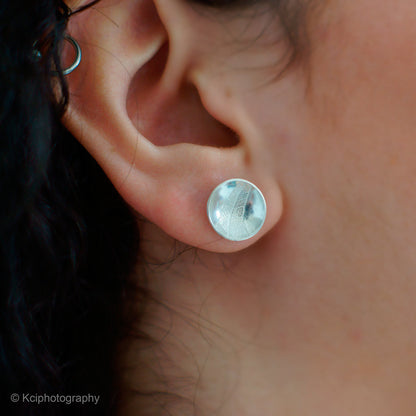 Kate Phipps Jewellery Domed circles stud earrings medium leaf skeleton textured silver model photo