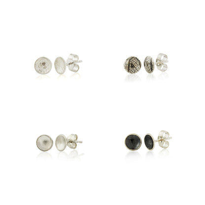 Kate Phipps Jewellery Domed circles stud earrings small four silver pairs in differed textures
