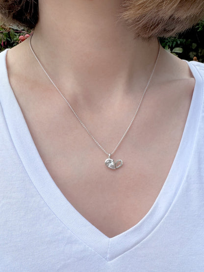 Facet line pendant with pear shaped cubic zirconia
