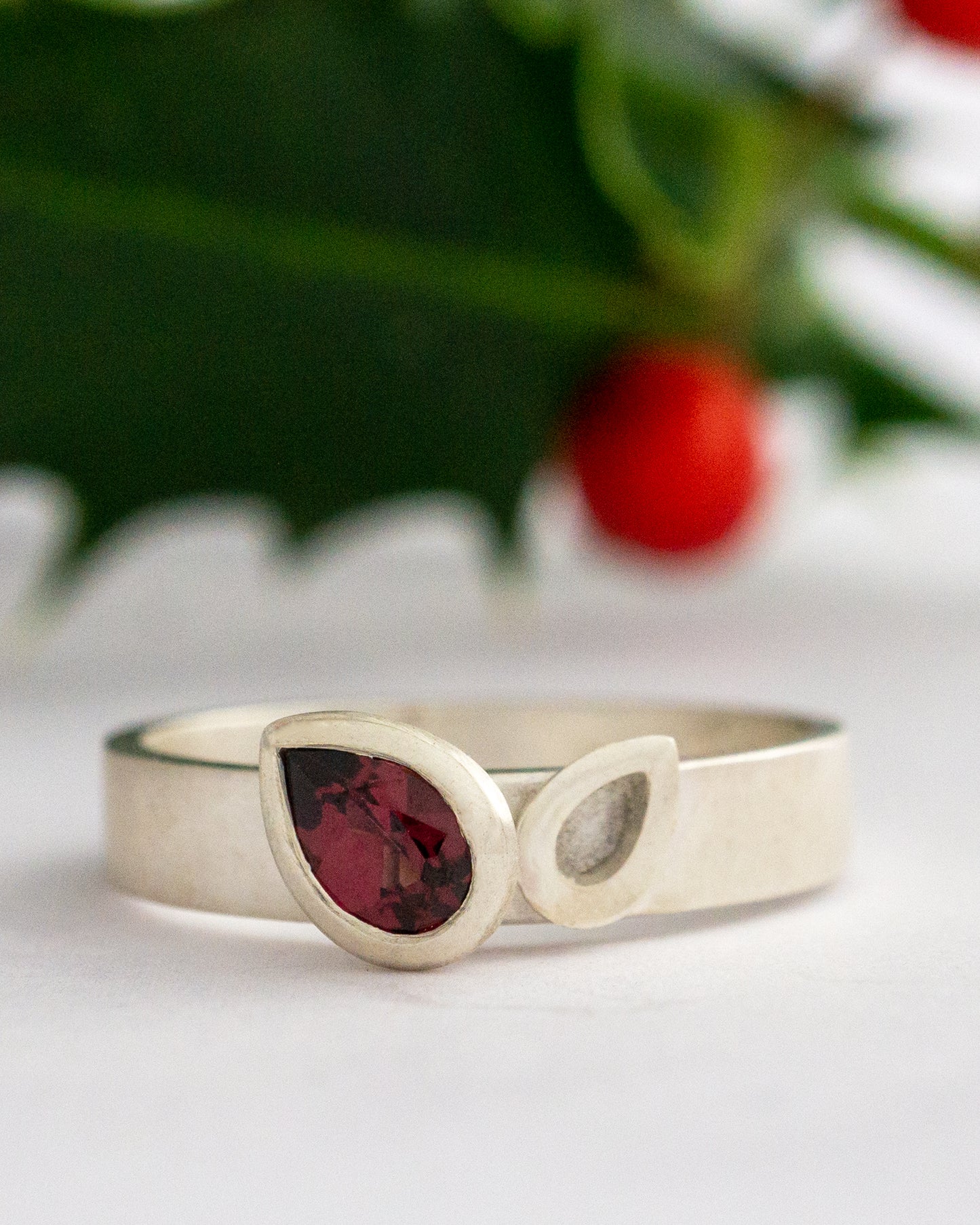 Pear shaped rhodolite garnet Facet Line ring - size Q to R