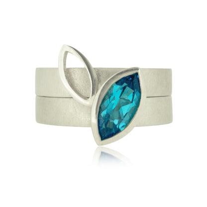 Facet Line ring set with marquise shaped Swiss blue topaz - size O to O 1/2