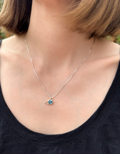Facet line pendant with trillion shaped Swiss blue topaz