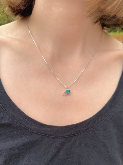 Facet line pendant with trillion shaped Swiss blue topaz