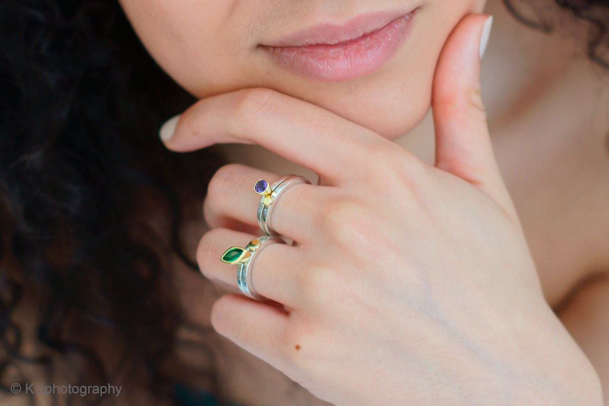 Kate Phipps Jewellery Nugget stacking ring pairs with amethyst tsavorite garnet 18 carat gold setting and nugget on silver ring bands model photo  2