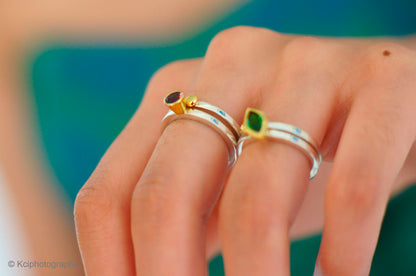 Kate Phipps Jewellery Nugget stacking ring pairs with amethyst tsavorite garnet 18 carat gold settings and nugget on silver ring bands model photo  1