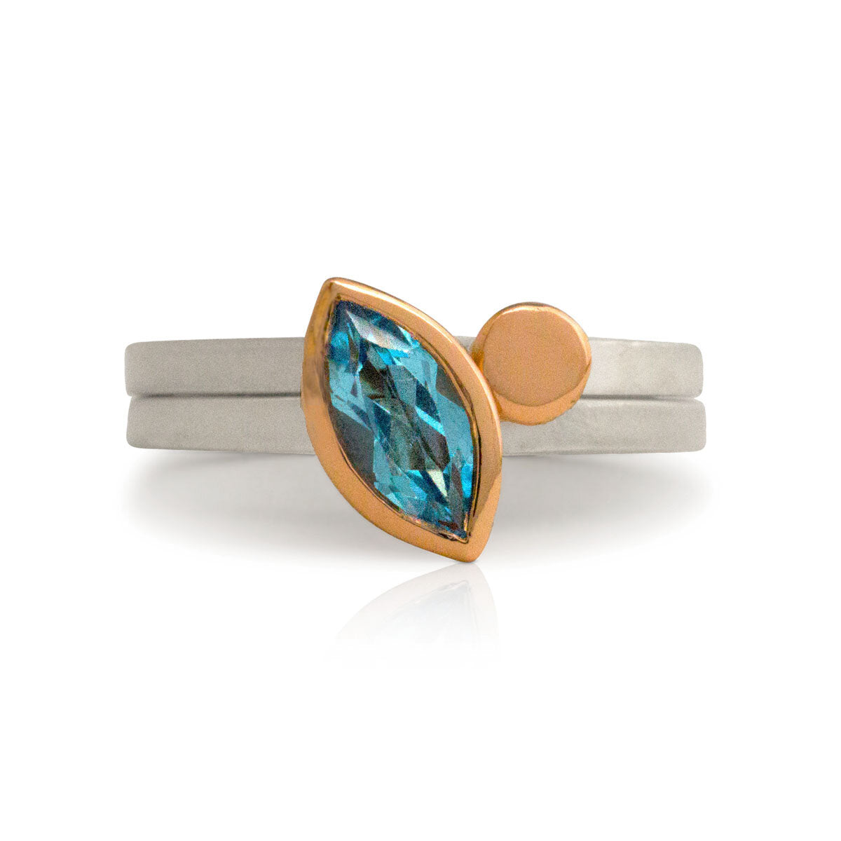 Kate Phipps Jewellery Nugget stacking ring set marquise cut Swiss blue topaz set in 9 carat rose gold rose gold nugget and silver