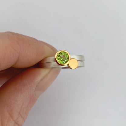 Kate Phipps Jewellery Nugget stacking rings set with peridot set in 18 carat yellow gold and gold nugget on silver ring bands model photo 2