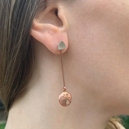 Kate Phipps Jewellery Scattered trillions long drop earrings 18 carat rose gold plated silver drop and silver trillion stud convex side of drop model photo