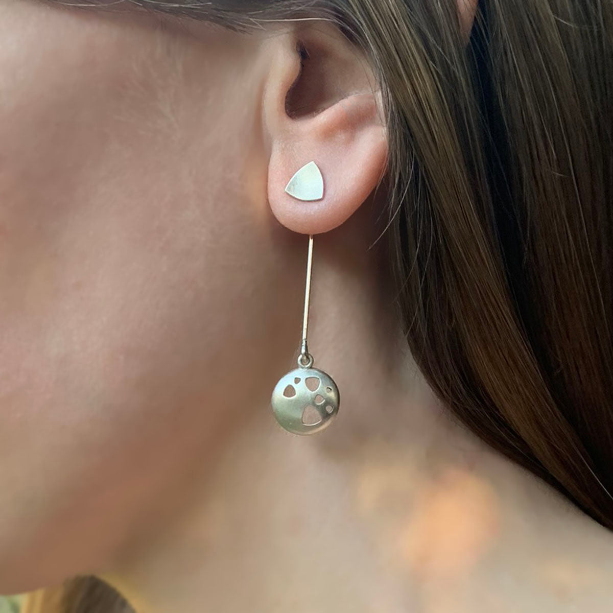 Kate Phipps Jewellery Scattered trillions long drop earrings convex side silver drop with silver trillion stud earrings model photo