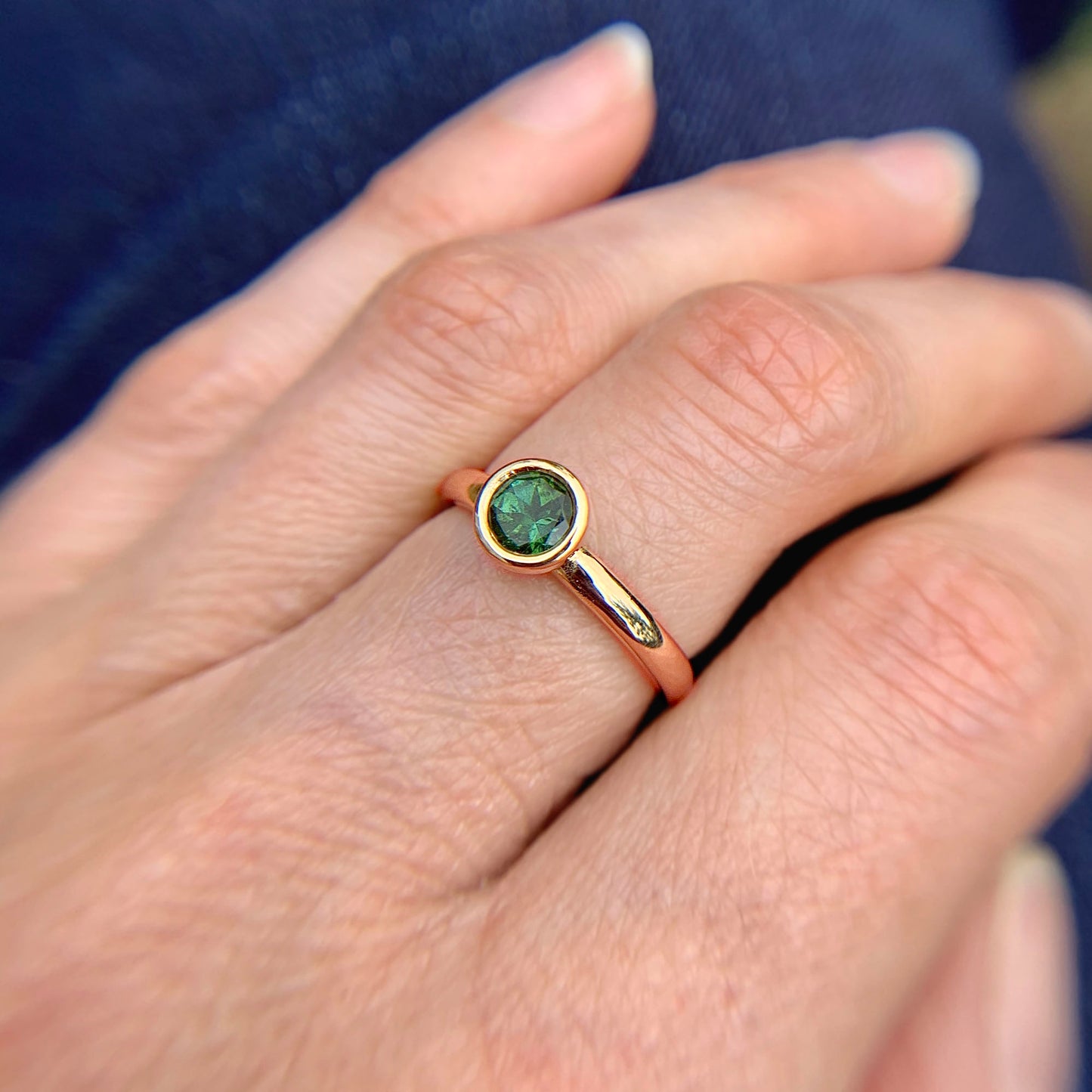 Kate Phipps Jewellery Scattered trillions ring green tourmaline in 9 carat yellow gold model photo 4