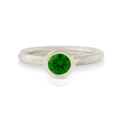 Kate Phipps Jewellery Scattered trillions ring silver and green cubic zirconia