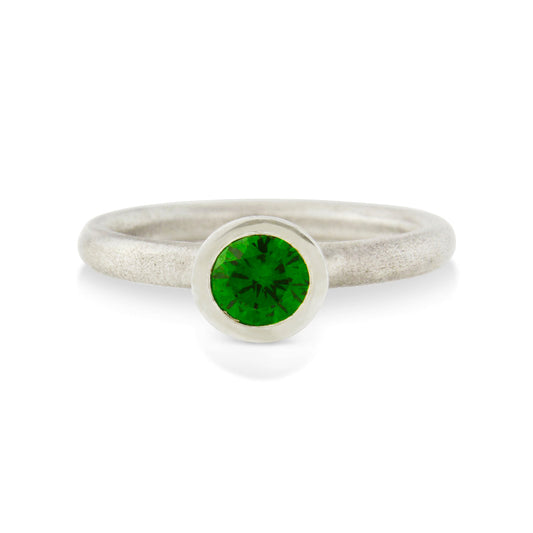 Kate Phipps Jewellery Scattered trillions ring silver and green cubic zirconia