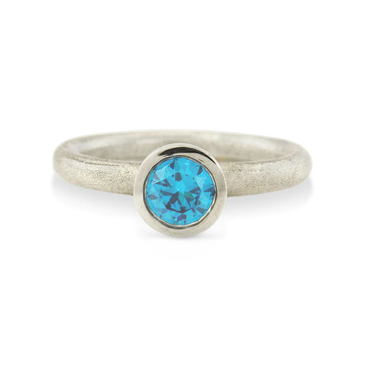 Kate Phipps Jewellery Scattered trillions ring silver and turquoise cubic zirconia