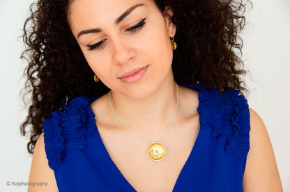 Kate Phipps Jewellery Scattered trillions set 22 carat yellow gold plated silver large pendant and drop earrings model photo