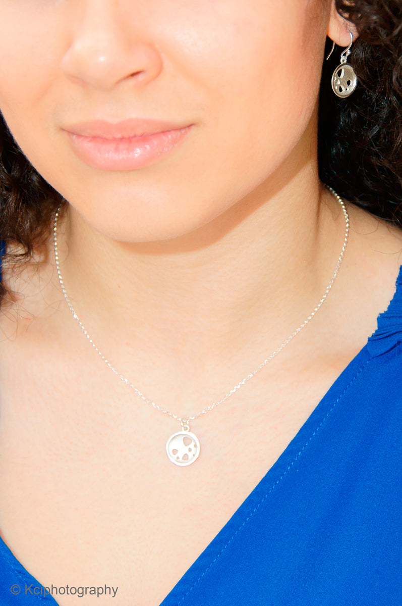 Kate Phipps Jewellery Scattered trillions set drop earrings and small necklace in silver model photo 