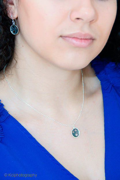 Kate Phipps Jewellery Scattered trillions set oxidised silver drop earrings and small oxidised silver necklace model photo 