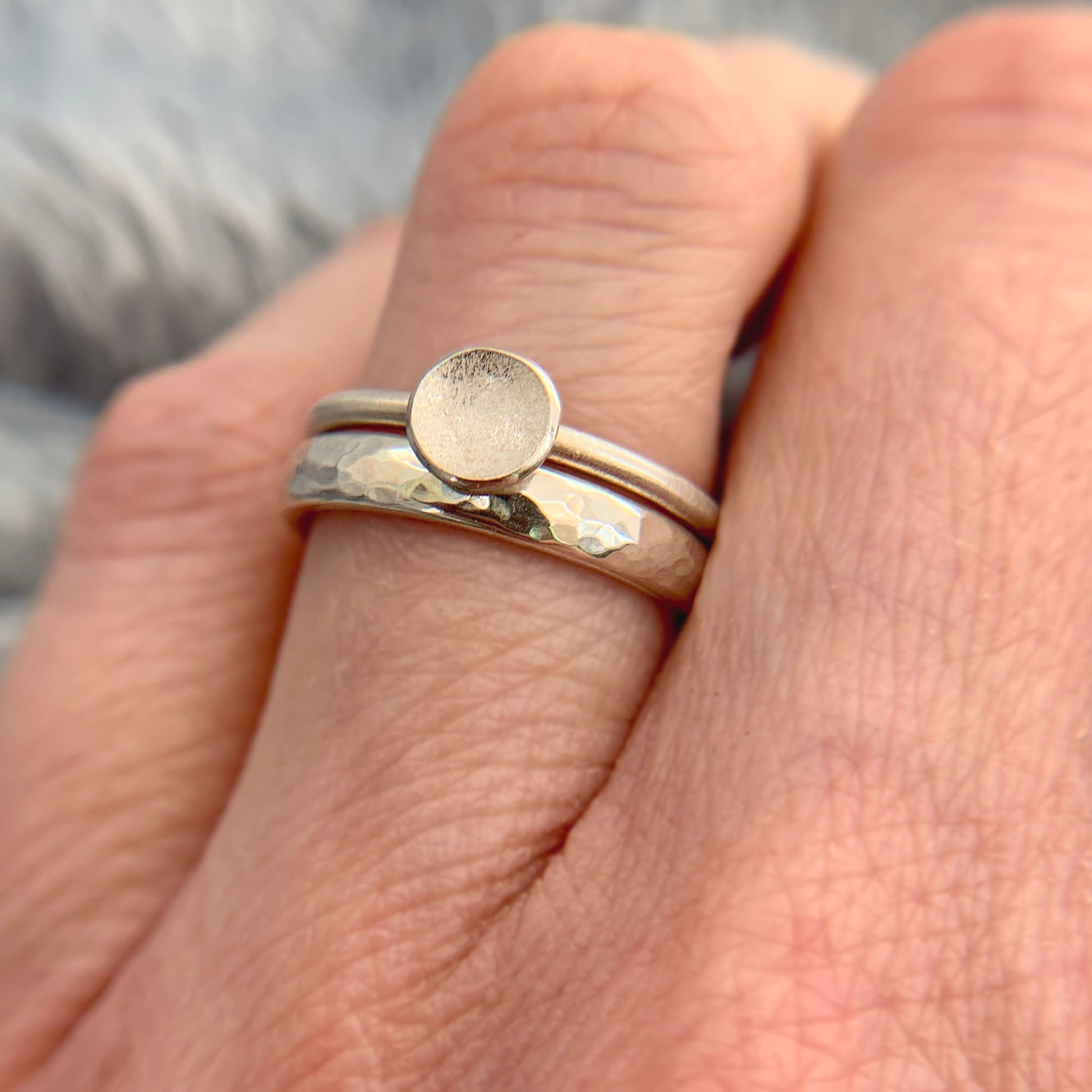 Kate Phipps Jewellery Simple elegance ring 3mm polished hammered silver stacked with domed circles ring small subtle polish model photo