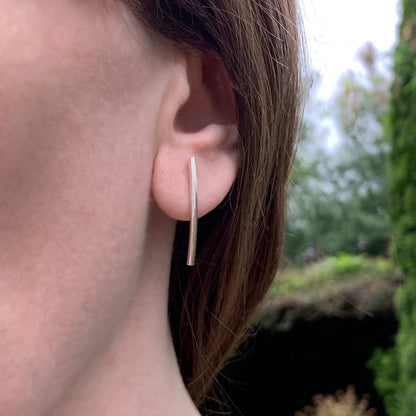 Kate Phipps Jewellery Simple elegance stud earrings long curved polished silver model photo