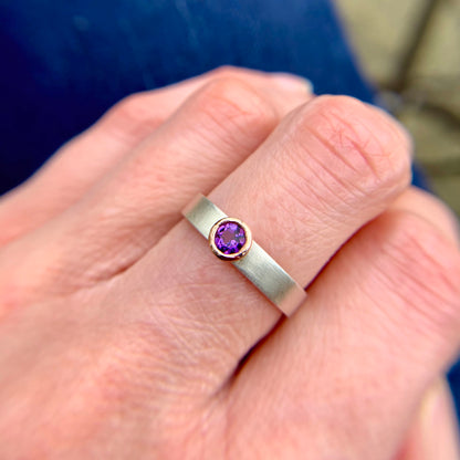 Kate Phipps Jewellery Solitaire ring round amethyst set in 9 carat rose gold on a silver ring band model photo 1