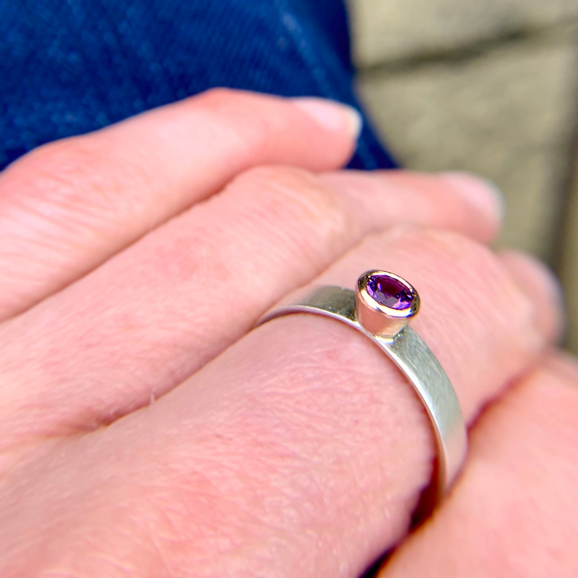 Kate Phipps Jewellery Solitaire ring round amethyst set in 9 carat rose gold on a silver ring band model photo 4