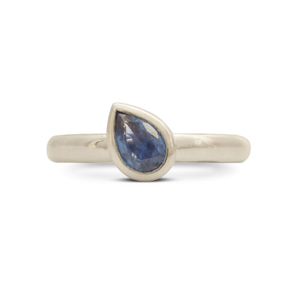 Kate Phipps Jewellery Solitaire ring silver and 6x4 mm pear blue sapphire angled