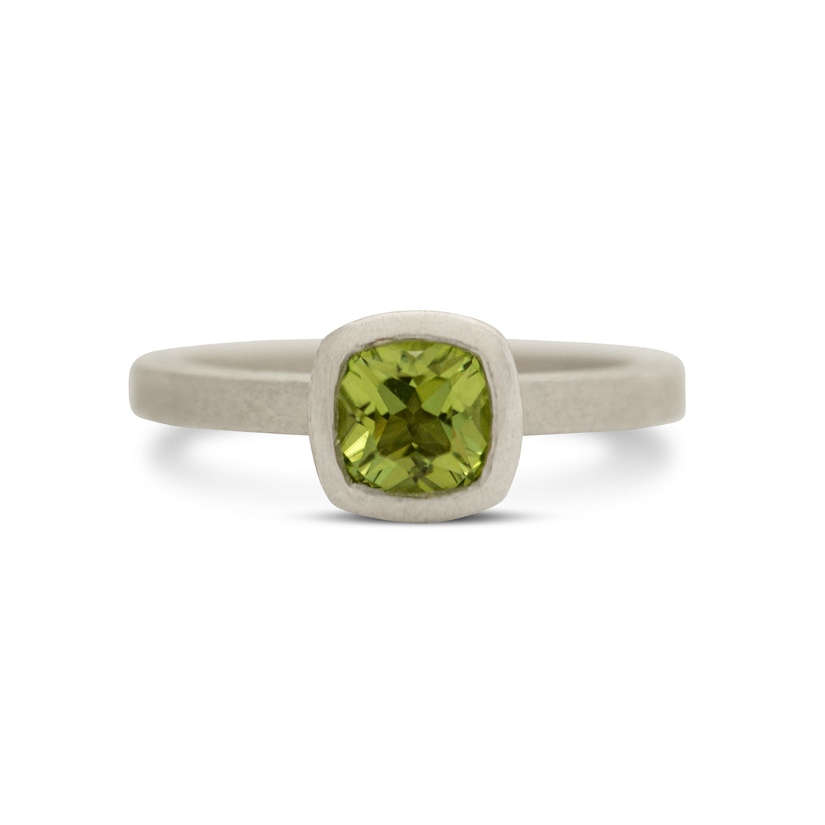 Kate Phipps Jewellery Solitaire ring silver and cushion cut peridot