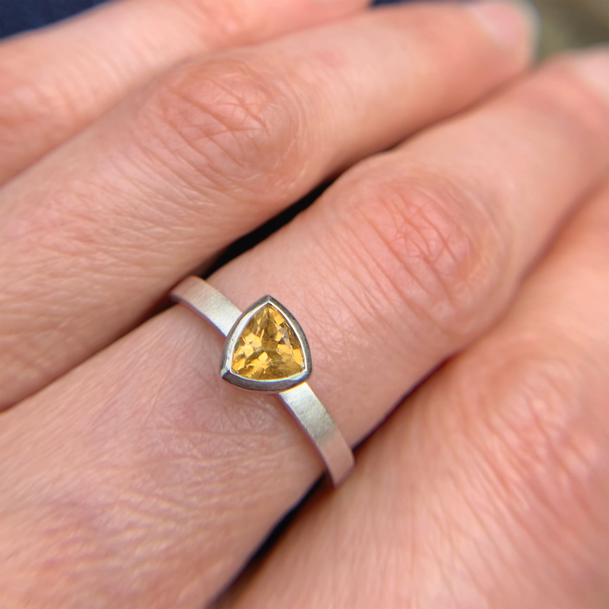 Kate Phipps Jewellery Solitaire ring trillion cut citrine and silver model photo