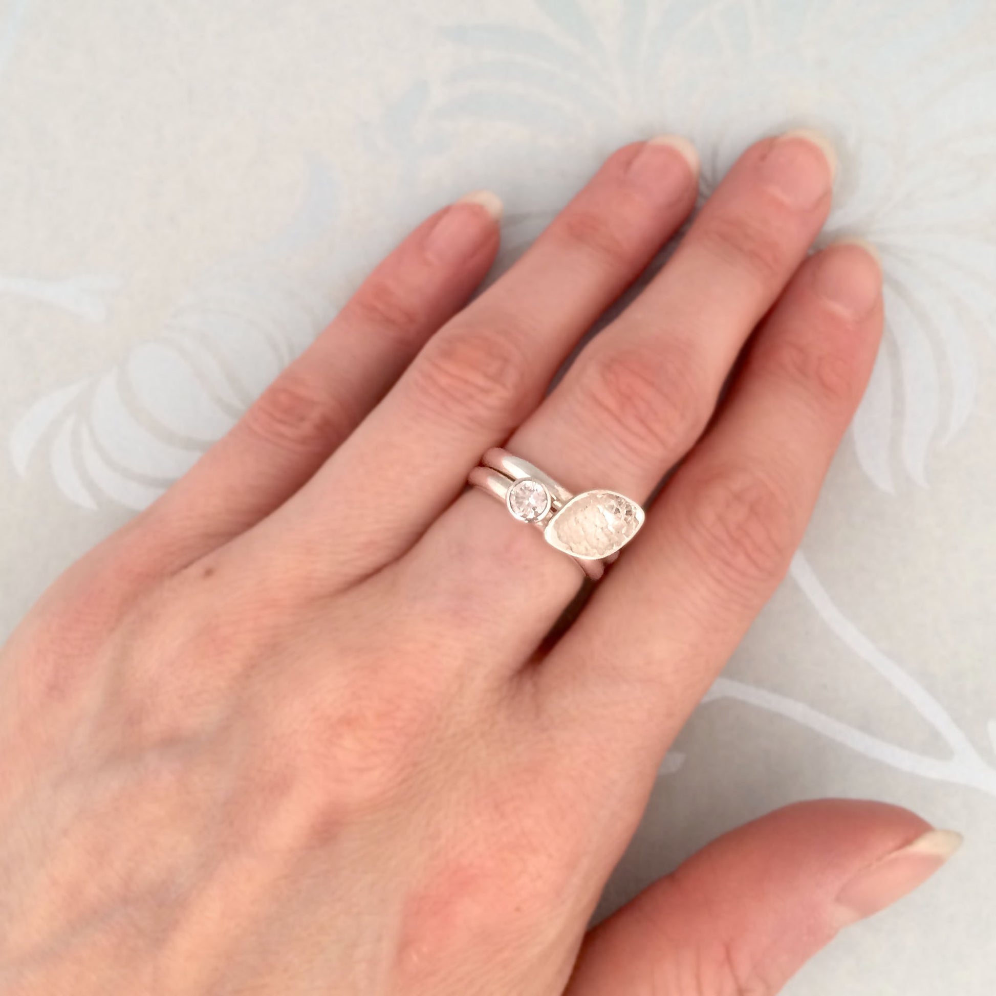 Kate Phipps Jewellery Stacking rings clear cubic zirconia and silver ring and lace textured leaf shaped silver ring model photo 2