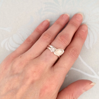 Kate Phipps Jewellery Stacking rings clear cubic zirconia and silver ring and lace textured leaf shaped silver ring model photo 2