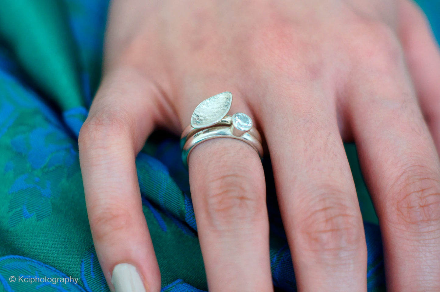 Kate Phipps Jewellery Stacking rings clear cubic zirconia and silver ring and lace textured leaf shaped silver ring model photo 