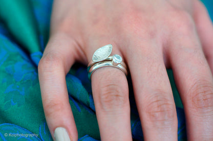 Kate Phipps Jewellery Stacking rings clear cubic zirconia and silver ring and lace textured leaf shaped silver ring model photo 