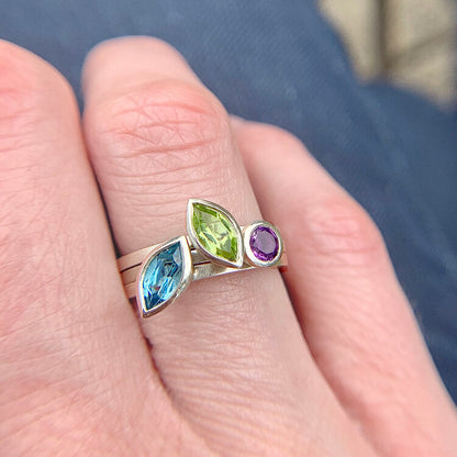 Kate Phipps Jewellery Stacking rings silver trio round amethyst marquise swiss blue topaz and marquise peridot model photo