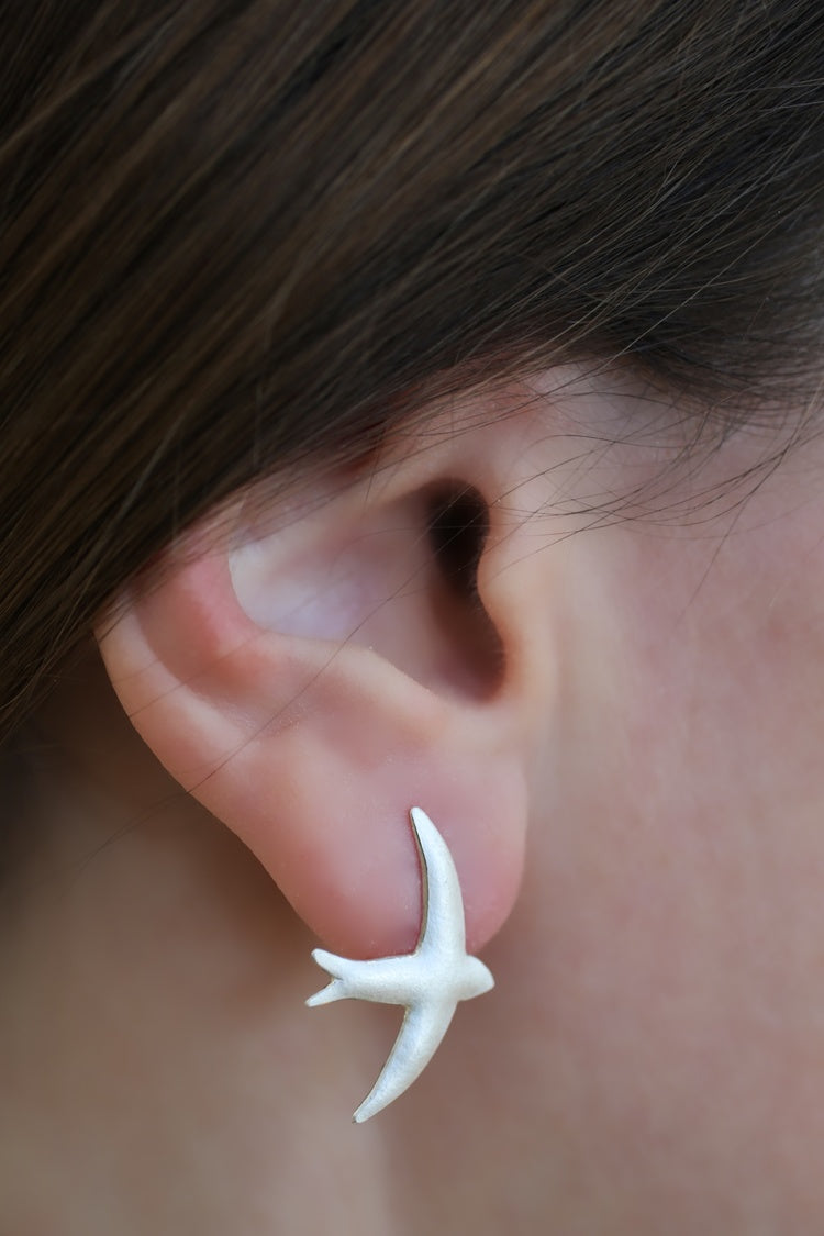 Kate Phipps Jewellery silver swift drop earrings satin finish model photo