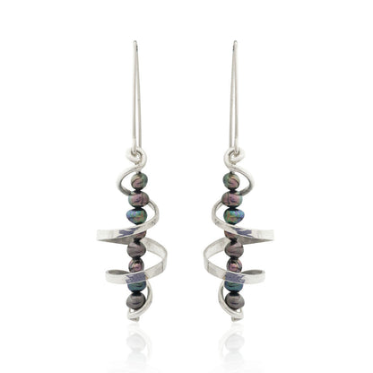 Kate Phipps Jewellery silver swirl and peacock pearl drop earrings product photo front on