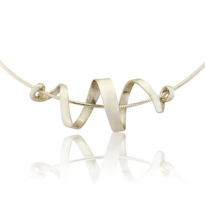 Kate Phipps Jewellery silver swirl necklace close up product photo
