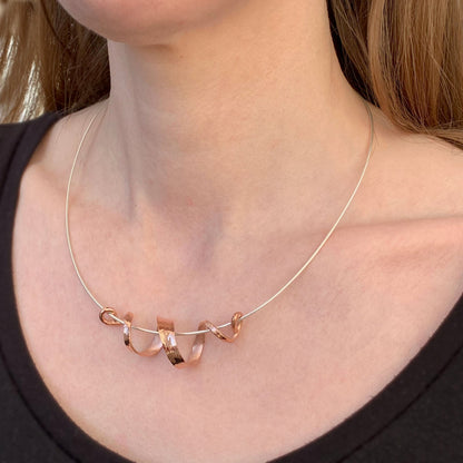 Kate Phipps Jewellery 18 carat rose gold plated silver swirl necklace model photo