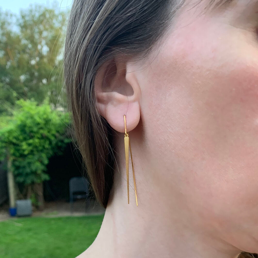 Kate Phipps Jewellery Tapered drop earrings 22 carat yellow gold plated silver model photo