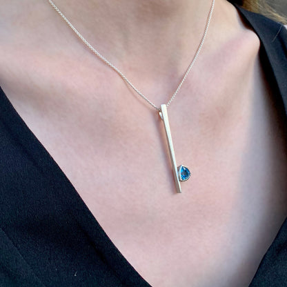 Kate Phipps Jewellery silver and trillion cut Swiss blue topaz necklace model photo