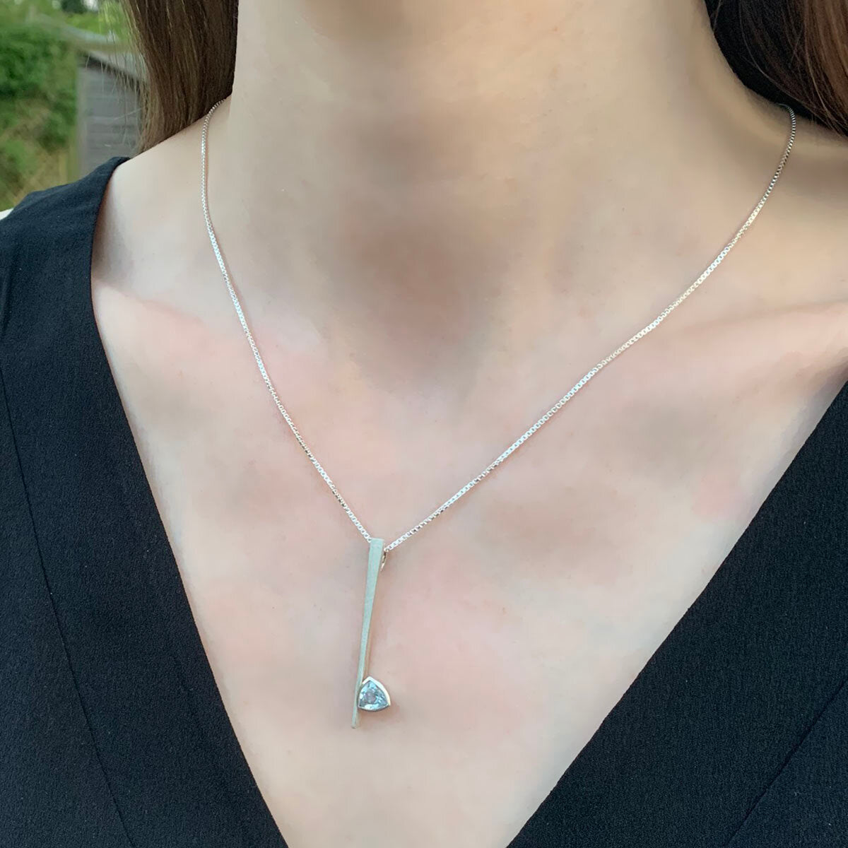 Kate Phipps Jewellery silver and trillion cut sky blue topaz necklace model photo