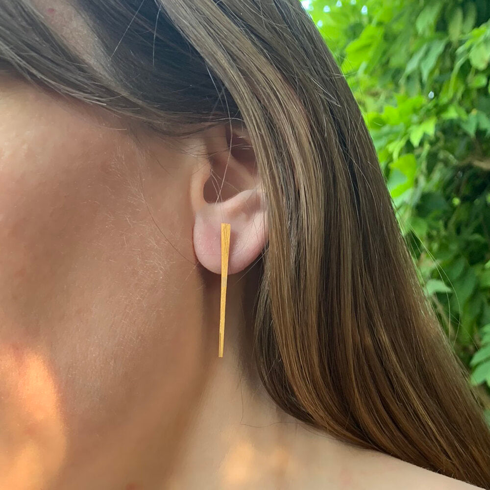 Kate Phipps Jewellery yellow gold plated silver tapered stud earrings model photo